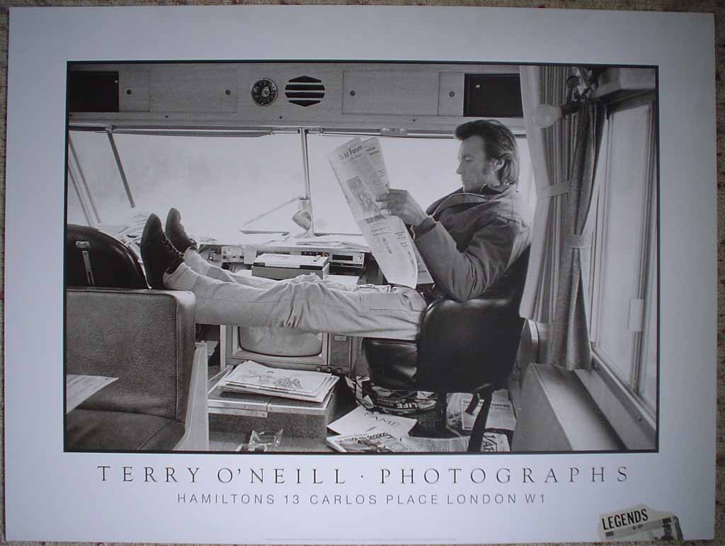 Clint Eastwood Joe Kidd by Terry O'Neill, shown with full margins - offset lithograph reproduction vintage poster print, from an original photograph by Terry O'Neill of Clint Eastwood relaxing during filming of Joe Kidd